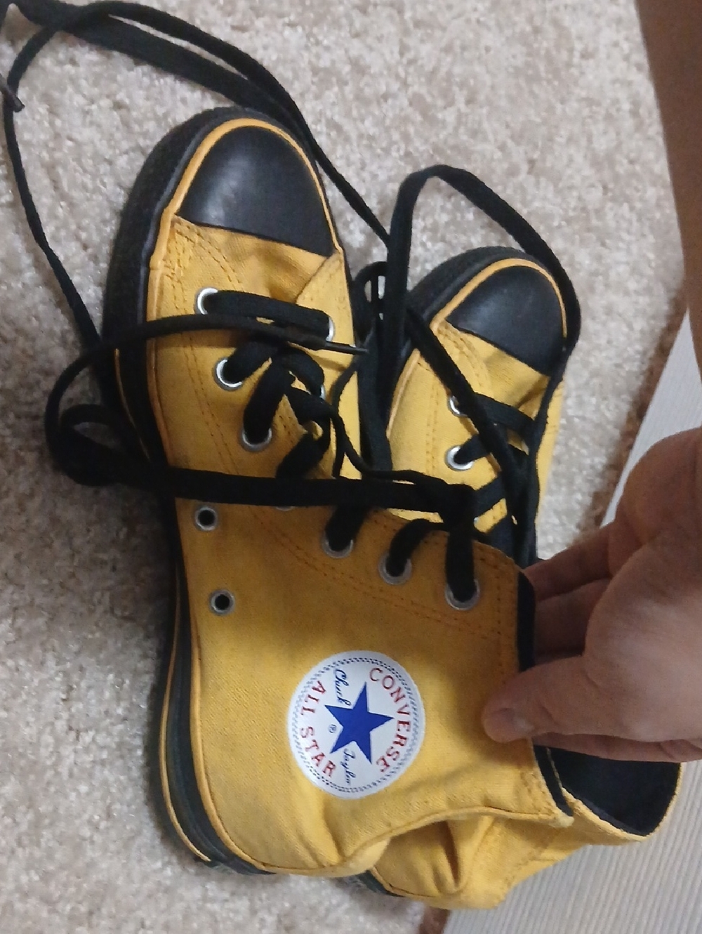 Converse Yellow and Black High-Top Sneakers
